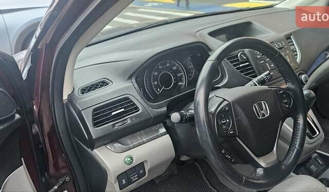 Красный Хонда СРВ, объемом двигателя 2.36 л и пробегом 158 тыс. км за 15600 $, фото 4 на Automoto.ua