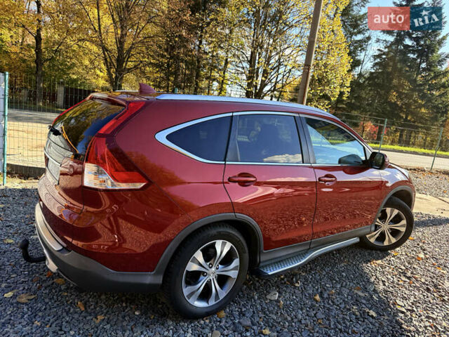 Красный Хонда СРВ, объемом двигателя 2.2 л и пробегом 293 тыс. км за 16599 $, фото 13 на Automoto.ua