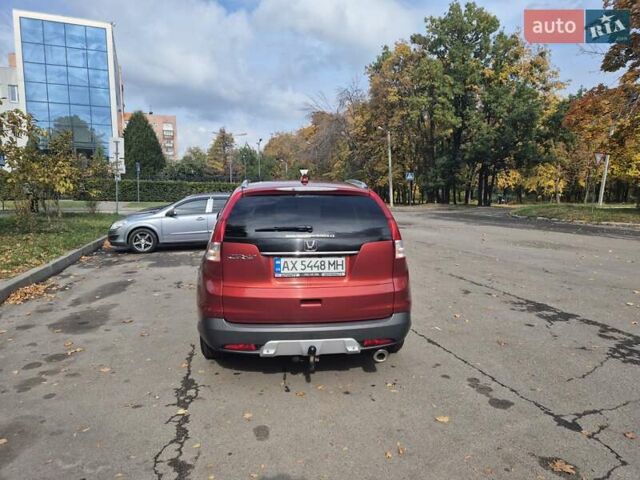 Красный Хонда СРВ, объемом двигателя 2.2 л и пробегом 257 тыс. км за 16900 $, фото 6 на Automoto.ua