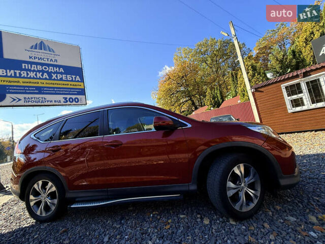 Хонда СРВ 2013 в Трускавце на Automoto.ua Красный Хонда СРВ, объемом двигателя 2.2 л и пробегом 293 тыс. км за 16599 $, фото 3 на Automoto.ua