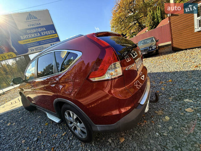 Хонда СРВ 2013 в Трускавце на Automoto.ua Красный Хонда СРВ, объемом двигателя 2.2 л и пробегом 293 тыс. км за 16599 $, фото 19 на Automoto.ua