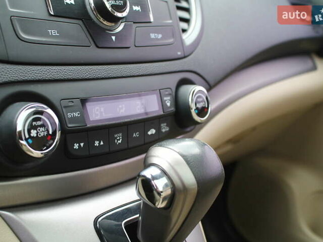 Красный Хонда СРВ, объемом двигателя 2.2 л и пробегом 183 тыс. км за 18200 $, фото 117 на Automoto.ua