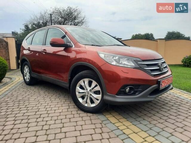 Красный Хонда СРВ, объемом двигателя 2.2 л и пробегом 206 тыс. км за 17699 $, фото 1 на Automoto.ua