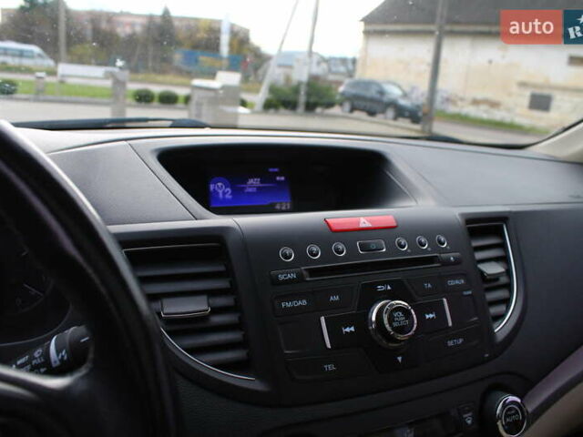 Красный Хонда СРВ, объемом двигателя 2.2 л и пробегом 183 тыс. км за 18200 $, фото 95 на Automoto.ua