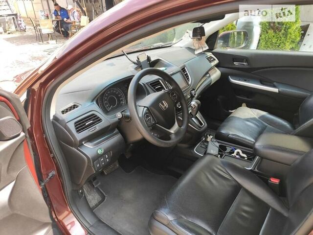 Красный Хонда СРВ, объемом двигателя 2.4 л и пробегом 195 тыс. км за 16700 $, фото 1 на Automoto.ua