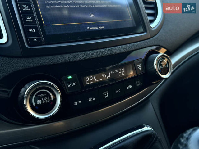 Красный Хонда СРВ, объемом двигателя 1.6 л и пробегом 121 тыс. км за 21700 $, фото 19 на Automoto.ua