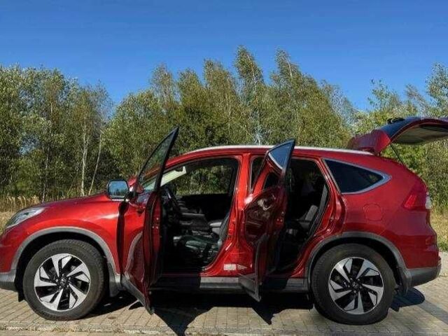 Красный Хонда СРВ, объемом двигателя 2 л и пробегом 180 тыс. км за 10200 $, фото 4 на Automoto.ua