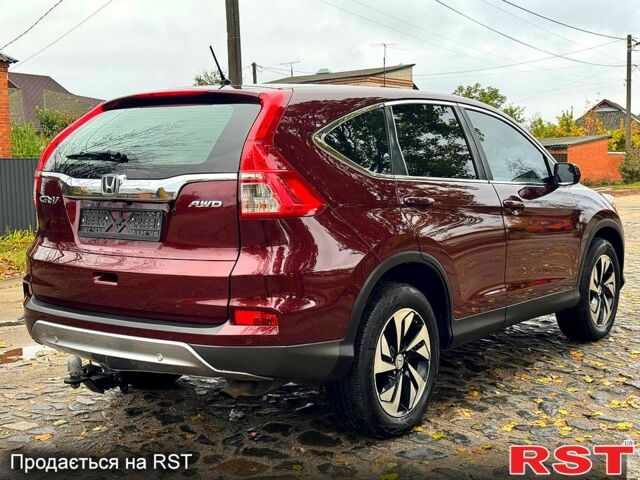 Красный Хонда СРВ, объемом двигателя 2.4 л и пробегом 128 тыс. км за 16550 $, фото 3 на Automoto.ua