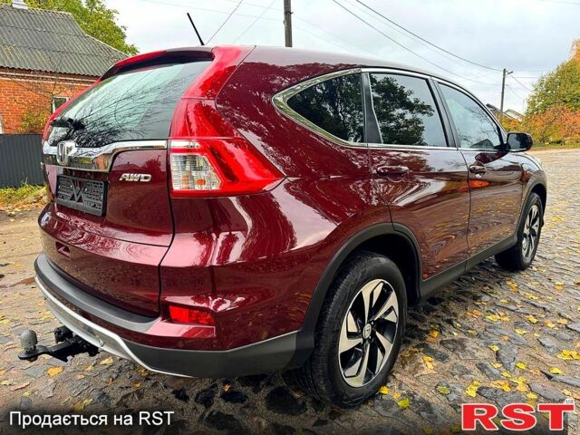 Красный Хонда СРВ, объемом двигателя 2.4 л и пробегом 128 тыс. км за 16550 $, фото 4 на Automoto.ua