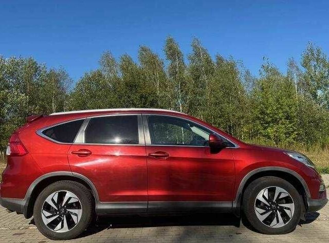 Красный Хонда СРВ, объемом двигателя 2 л и пробегом 180 тыс. км за 10200 $, фото 3 на Automoto.ua