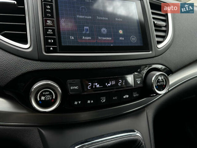 Красный Хонда СРВ, объемом двигателя 1.6 л и пробегом 238 тыс. км за 15500 $, фото 51 на Automoto.ua