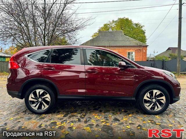 Красный Хонда СРВ, объемом двигателя 2.4 л и пробегом 128 тыс. км за 16550 $, фото 2 на Automoto.ua