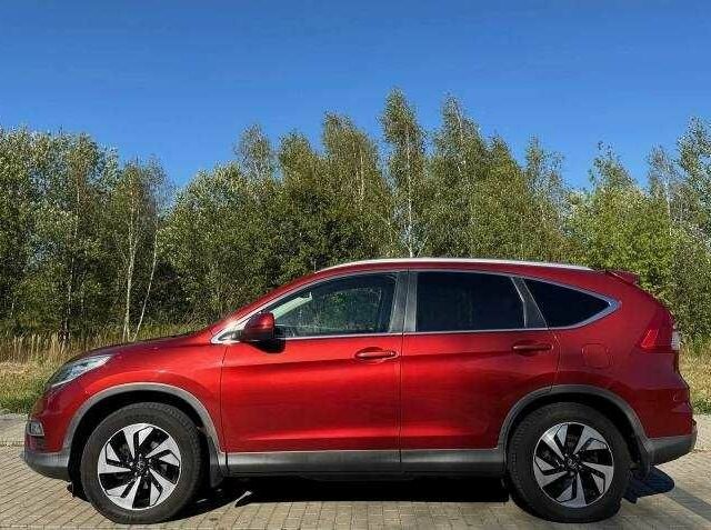 Красный Хонда СРВ, объемом двигателя 2 л и пробегом 180 тыс. км за 10200 $, фото 5 на Automoto.ua