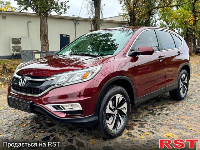 Красный Хонда СРВ, объемом двигателя 2.4 л и пробегом 128 тыс. км за 16550 $, фото 1 на Automoto.ua