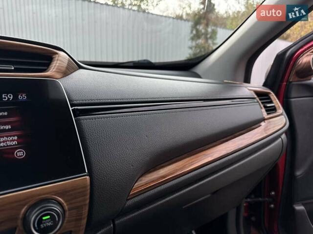 Красный Хонда СРВ, объемом двигателя 2 л и пробегом 88 тыс. км за 25400 $, фото 63 на Automoto.ua