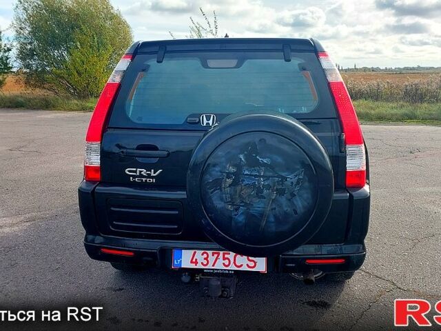 Хонда СРВ, объемом двигателя 2.2 л и пробегом 283 тыс. км за 4799 $, фото 4 на Automoto.ua