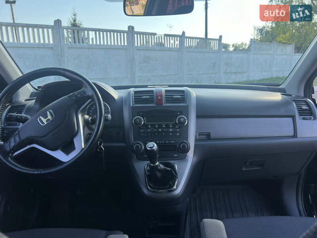 Хонда СРВ, объемом двигателя 2 л и пробегом 211 тыс. км за 10500 $, фото 8 на Automoto.ua