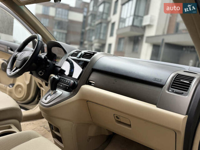 Желтый Хонда СРВ, объемом двигателя 2.4 л и пробегом 297 тыс. км за 8990 $, фото 24 на Automoto.ua