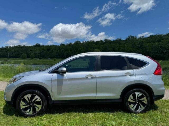 Серый Хонда СРВ, объемом двигателя 2.4 л и пробегом 70 тыс. км за 11400 $, фото 3 на Automoto.ua