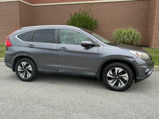 Серый Хонда СРВ, объемом двигателя 2 л и пробегом 79 тыс. км за 9000 $, фото 2 на Automoto.ua