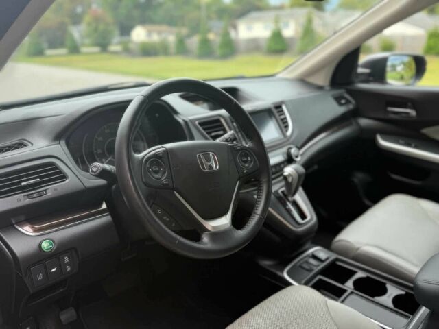 Серый Хонда СРВ, объемом двигателя 2 л и пробегом 79 тыс. км за 9000 $, фото 7 на Automoto.ua