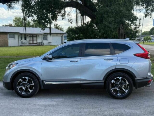 Серый Хонда СРВ, объемом двигателя 1.5 л и пробегом 69 тыс. км за 14000 $, фото 4 на Automoto.ua