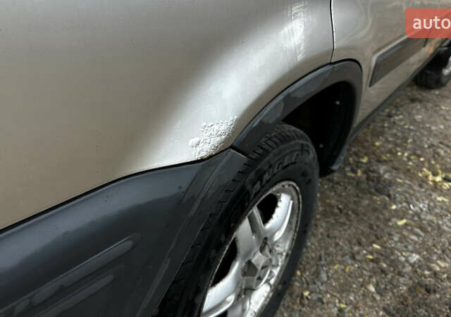 Серый Хонда СРВ, объемом двигателя 2 л и пробегом 312 тыс. км за 5000 $, фото 3 на Automoto.ua