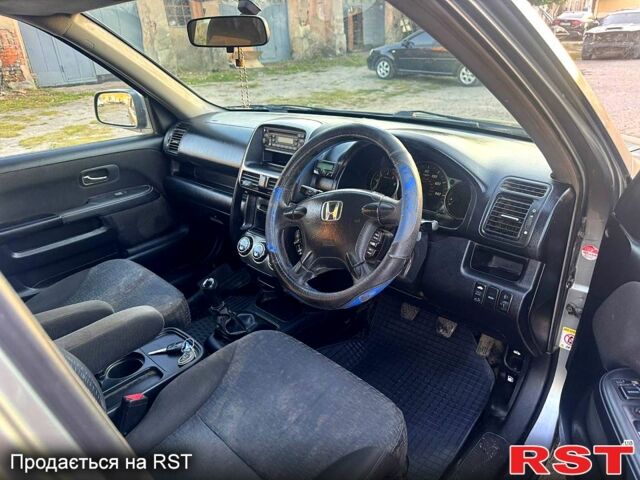 Серый Хонда СРВ, объемом двигателя 2.2 л и пробегом 233 тыс. км за 3000 $, фото 6 на Automoto.ua