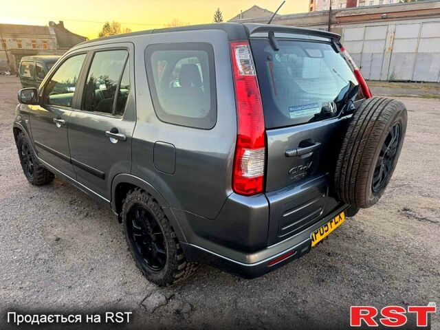 Серый Хонда СРВ, объемом двигателя 2.2 л и пробегом 233 тыс. км за 3000 $, фото 1 на Automoto.ua