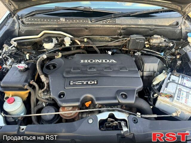 Серый Хонда СРВ, объемом двигателя 2.2 л и пробегом 233 тыс. км за 3000 $, фото 9 на Automoto.ua