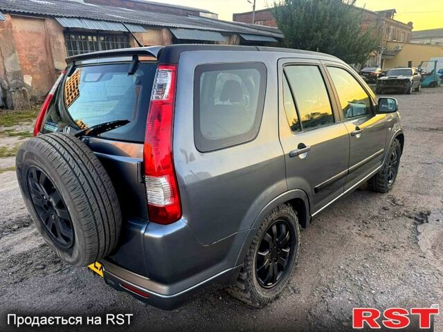 Серый Хонда СРВ, объемом двигателя 2.2 л и пробегом 233 тыс. км за 3000 $, фото 4 на Automoto.ua