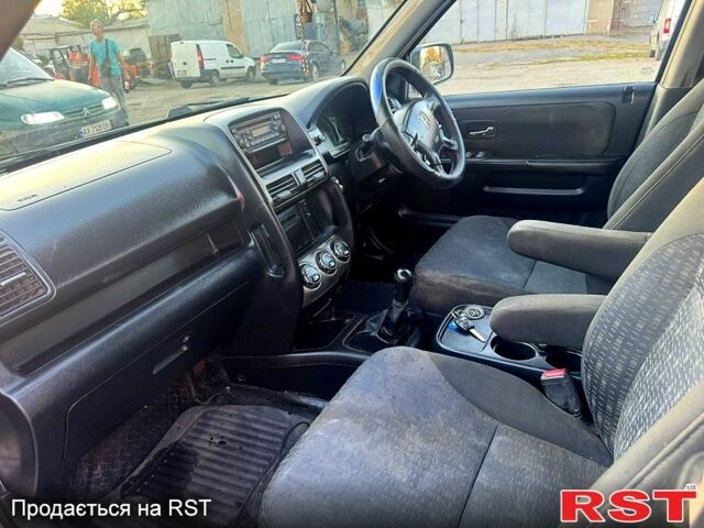 Серый Хонда СРВ, объемом двигателя 2.2 л и пробегом 233 тыс. км за 3000 $, фото 7 на Automoto.ua