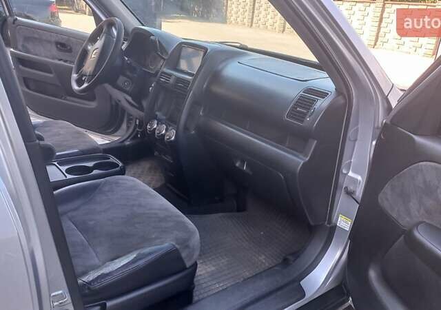 Серый Хонда СРВ, объемом двигателя 2 л и пробегом 240 тыс. км за 6700 $, фото 15 на Automoto.ua