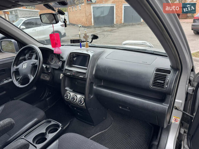 Серый Хонда СРВ, объемом двигателя 2 л и пробегом 228 тыс. км за 5800 $, фото 25 на Automoto.ua
