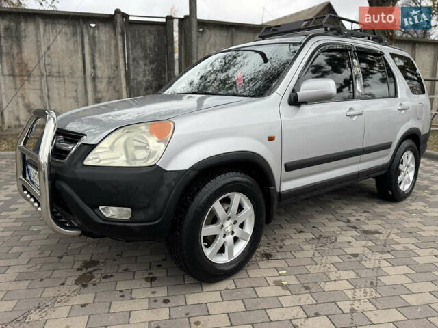 Серый Хонда СРВ, объемом двигателя 2 л и пробегом 228 тыс. км за 5800 $, фото 2 на Automoto.ua