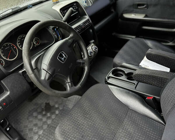 Серый Хонда СРВ, объемом двигателя 2 л и пробегом 178 тыс. км за 7500 $, фото 8 на Automoto.ua