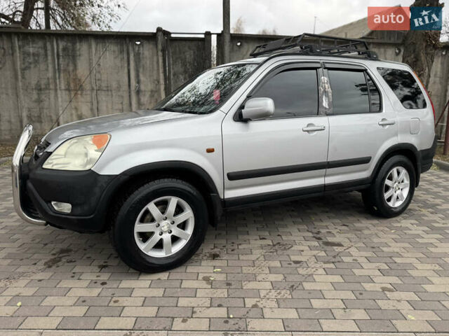 Серый Хонда СРВ, объемом двигателя 2 л и пробегом 228 тыс. км за 5800 $, фото 1 на Automoto.ua