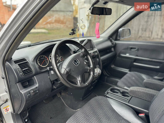 Серый Хонда СРВ, объемом двигателя 2 л и пробегом 228 тыс. км за 5800 $, фото 22 на Automoto.ua
