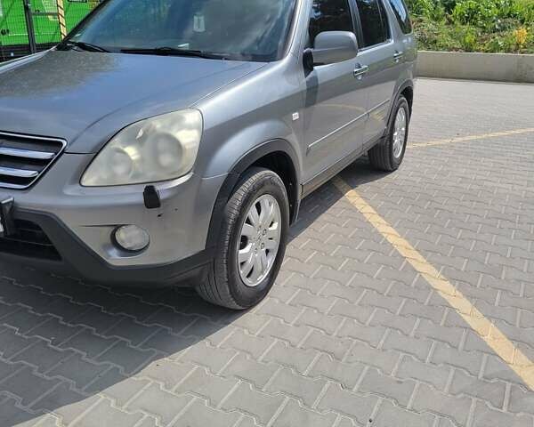 Серый Хонда СРВ, объемом двигателя 2.2 л и пробегом 317 тыс. км за 7500 $, фото 1 на Automoto.ua