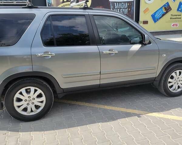 Серый Хонда СРВ, объемом двигателя 2.2 л и пробегом 317 тыс. км за 7500 $, фото 6 на Automoto.ua