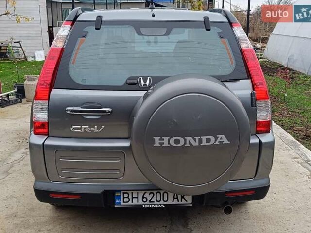 Серый Хонда СРВ, объемом двигателя 2 л и пробегом 256 тыс. км за 7500 $, фото 1 на Automoto.ua