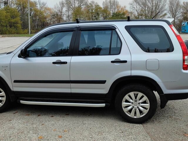 Серый Хонда СРВ, объемом двигателя 2 л и пробегом 254 тыс. км за 8700 $, фото 1 на Automoto.ua