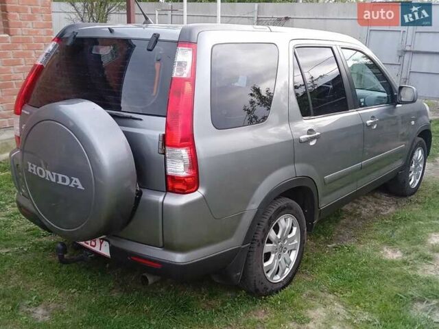 Серый Хонда СРВ, объемом двигателя 2 л и пробегом 318 тыс. км за 9999 $, фото 1 на Automoto.ua