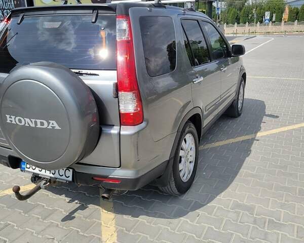 Серый Хонда СРВ, объемом двигателя 2.2 л и пробегом 317 тыс. км за 7500 $, фото 5 на Automoto.ua