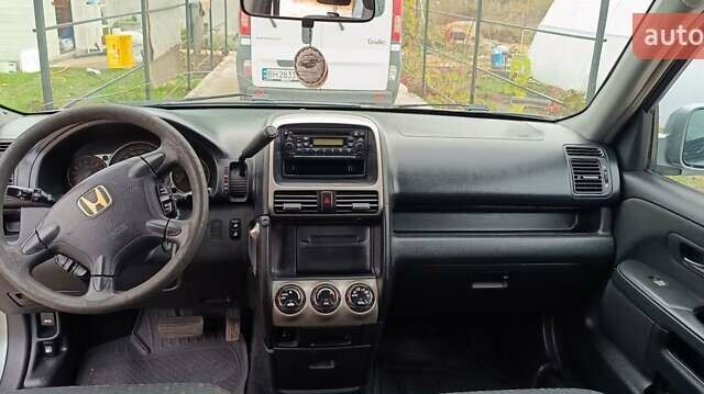 Серый Хонда СРВ, объемом двигателя 2 л и пробегом 256 тыс. км за 7500 $, фото 7 на Automoto.ua