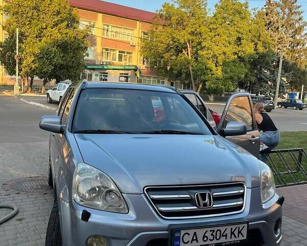 Серый Хонда СРВ, объемом двигателя 2 л и пробегом 251 тыс. км за 7500 $, фото 5 на Automoto.ua