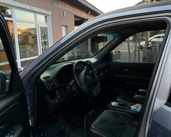 Серый Хонда СРВ, объемом двигателя 2 л и пробегом 251 тыс. км за 7500 $, фото 9 на Automoto.ua