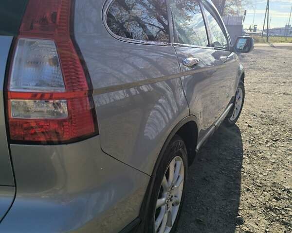 Серый Хонда СРВ, объемом двигателя 2.2 л и пробегом 285 тыс. км за 8999 $, фото 2 на Automoto.ua