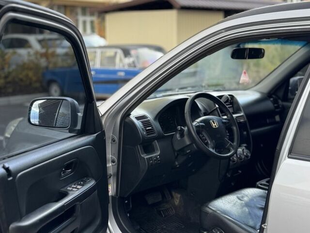 Серый Хонда СРВ, объемом двигателя 2 л и пробегом 285 тыс. км за 5999 $, фото 7 на Automoto.ua