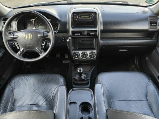 Серый Хонда СРВ, объемом двигателя 2.2 л и пробегом 259 тыс. км за 3200 $, фото 3 на Automoto.ua